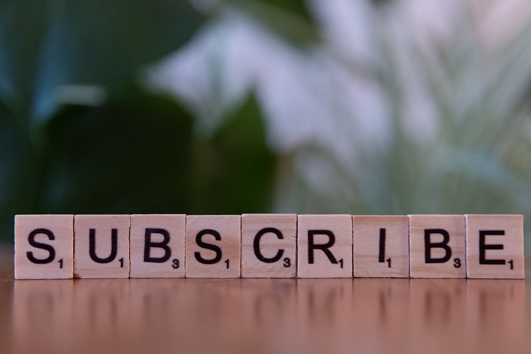 a-wooden-block-spelling-subscribe-on-a-table-gdpdaj8unb4
